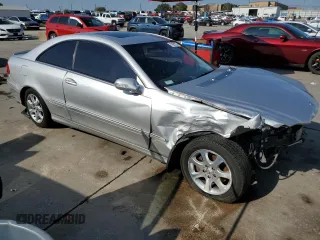2003 Mercedes-Benz CLK 320 with VIN WDBTJ65J43F038135, listed as a Copart auction lot 71801574 with 220,256 mi miles and Salvage Title. Bid and sale history available at DreamBid. Image 4.