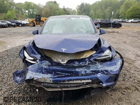2022 Tesla Model Y Long Range z VIN 7SAYGDEE6NF318808, wystawiony jako Copart lot #57219915 z przebiegiem Nie podano mil oraz Szkoda całkowita • Salvage title. Historia ofert i sprzedaży dostępna na DreamBid. Obrazek 5.