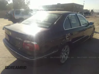 1997 BMW 5 Series 528iA with VIN WBADD6328VBW23350, listed as a IAAI auction lot 41707835 with 272,299 mi miles. Bid and sale history available at carsss.com. Image 4.