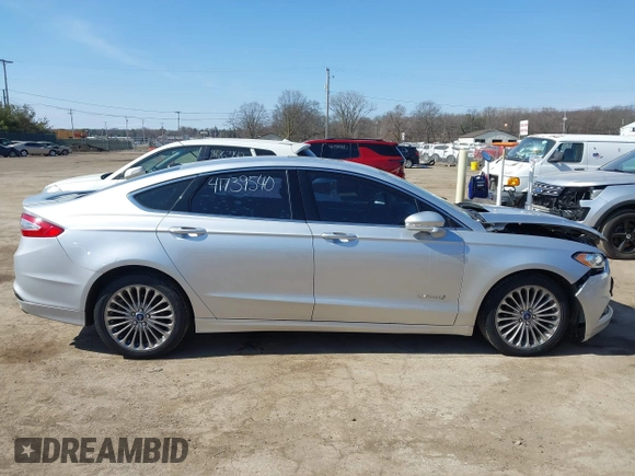 2014 Ford Fusion Titanium Hybrid with VIN 3FA6P0RU9ER147443, listed as a IAAI auction lot 41739540 with 146,359 mi miles. Bid and sale history available at carsss.com. Image 14.