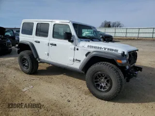 2023 Jeep Wrangler Sport S with VIN 1C4HJXDGXPW665818, listed as a Copart auction lot 48357105 with 9,803 mi miles and Clean Title. Bid and sale history available at DreamBid. Image 4.