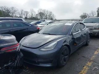 2019 Tesla Model 3 Mid Range with VIN 5YJ3E1EA3KF426971, listed as a IAAI auction lot 41564939 with Not Provided miles and . Bid and sale history available at carsss.com. Image 2.