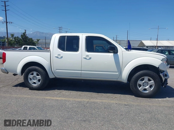 2005 Nissan Frontier LE with VIN 1N6AD07U75C456114, listed as a IAAI auction lot 42222661 with 165,651 mi miles and . Bid and sale history available at DreamBid. Image 13.