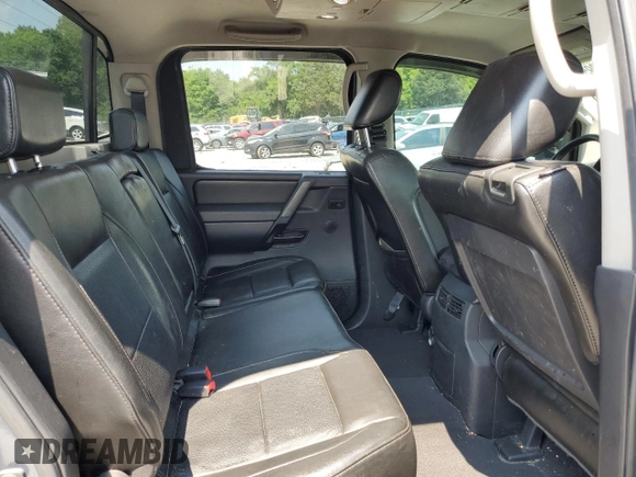 2011 Nissan Titan SL with VIN 1N6AA0EC4BN305296, listed as a Copart auction lot 59001395 with 194,557 mi miles and Salvage title. Bid and sale history available at DreamBid. Image 10.