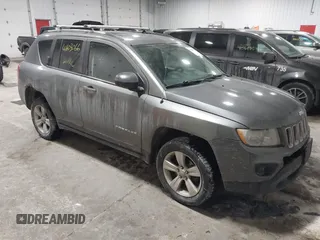 2011 Jeep Compass with VIN 1J4NF1FB8BD239417, listed as a IAAI auction lot 41603066 with 165,938 mi miles. Bid and sale history available at carsss.com. Image 1.