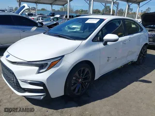 2024 Toyota Corolla Hybrid LE with VIN JTDBCMFE9RJ022063, listed as a IAAI auction lot 41695257 with 21,960 mi miles. Bid and sale history available at carsss.com. Image 2.