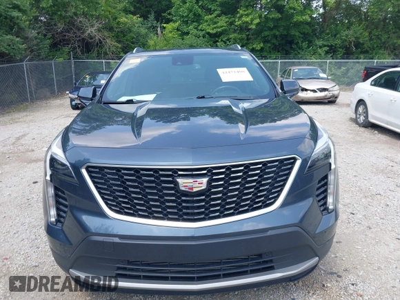 2019 Cadillac XT4 FWD Premium Luxury z VIN 1GYFZCR43KF143980, wystawiony jako IAAI lot #42472400 z przebiegiem 36 496 mil mil oraz . Historia ofert i sprzedaży dostępna na DreamBid. Obrazek 12.