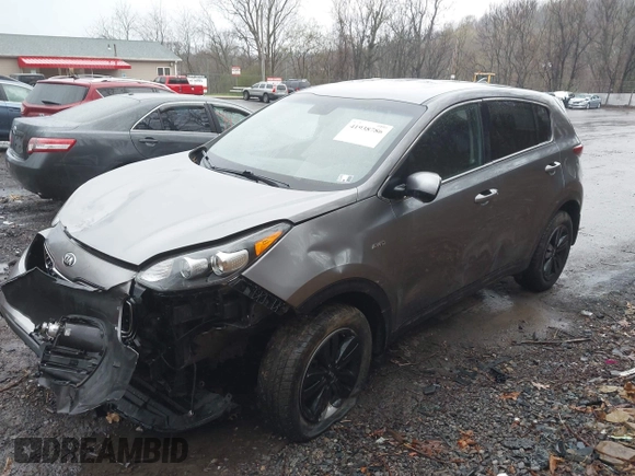 2017 Kia Sportage LX with VIN KNDPMCAC8H7173202, listed as a IAAI auction lot 41938786 with 80,022 mi miles and . Bid and sale history available at carsss.com. Image 2.