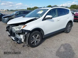 2018 Toyota RAV4 XLE with VIN JTMWFREV7JJ174483, listed as a IAAI auction lot 41597797 with 82,836 mi miles. Bid and sale history available at carsss.com. Image 2.
