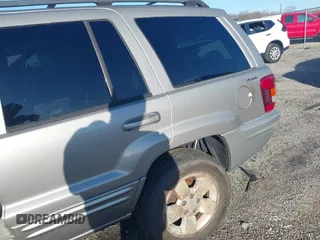 2001 Jeep Grand Cherokee Limited with VIN 1J4GW58N11C650606, listed as a IAAI auction lot 41722256 with 1 mi miles. Bid and sale history available at carsss.com. Image 6.