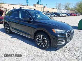 2021 Audi Q5 Premium Plus with VIN WA1BAAFY3M2023012, listed as a IAAI auction lot 41983076 with 71,249 mi miles. Bid and sale history available at carsss.com. Image 1.