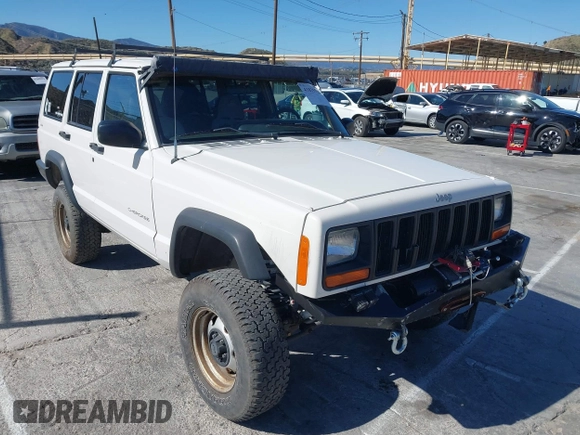 1997 Jeep Cherokee SE with VIN 1J4FJ28S7VL553270, listed as a IAAI auction lot 41825524 with 157,015 mi miles. Bid and sale history available at carsss.com. Image 1.