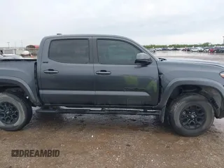 2022 Toyota Tacoma SR5 with VIN 3TMAZ5CN9NM195132, listed as a IAAI auction lot 42383482 with 51,011 mi miles and . Bid and sale history available at DreamBid. Image 14.