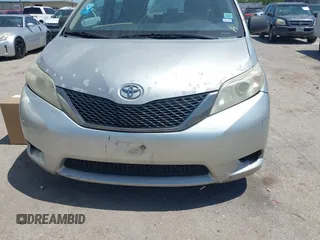 2014 Toyota Sienna L with VIN 5TDZK3DC1ES410012, listed as a IAAI auction lot 42005001 with 440,789 mi miles. Bid and sale history available at carsss.com. Image 6.