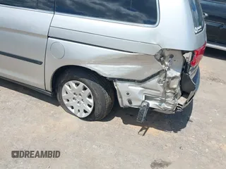 2008 Honda Odyssey LX with VIN 5FNRL38228B090366, listed as a IAAI auction lot 42336820 with 319,401 mi miles and . Bid and sale history available at DreamBid. Image 6.