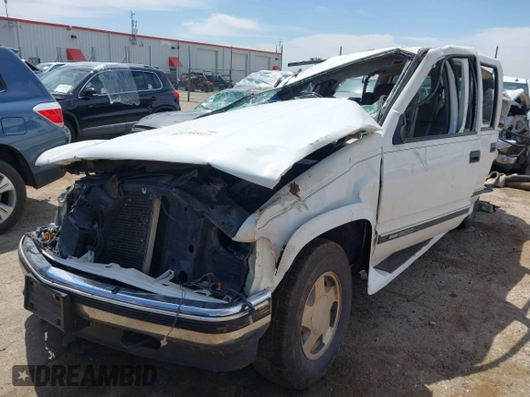 1999 GMC Suburban with VIN 1GDFK16R0XJ728255, listed as a IAAI auction lot 42230595 with Not provided miles and . Bid and sale history available at DreamBid. Image 17.