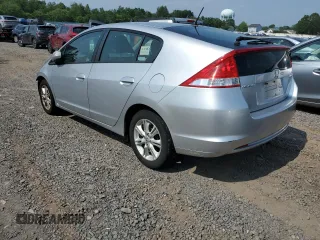 2010 Honda Insight EX with VIN JHMZE2H77AS015329, listed as a Copart auction lot 60502835 with 213,397 mi miles and Clean title. Bid and sale history available at DreamBid. Image 2.