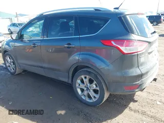 2016 Ford Escape Titanium with VIN 1FMCU9J96GUB96009, listed as a IAAI auction lot 41866127 with 132,990 mi miles and . Bid and sale history available at DreamBid. Image 3.
