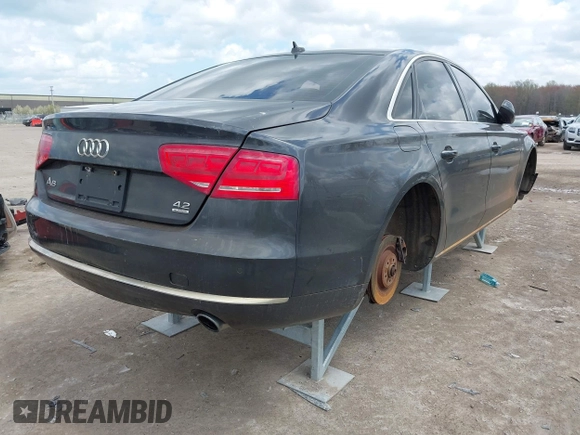 2011 Audi A8 with VIN WAUAVAFD7BN023512, listed as a IAAI auction lot 42083983 with Not provided miles and . Bid and sale history available at DreamBid. Image 4.