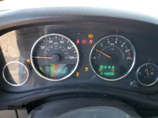 2012 Jeep Wrangler Arctic z VIN 1C4AJWBGXCL156600, wystawiony jako Copart lot #56369065 z przebiegiem 216 808 mil mil oraz Szkoda całkowita • Salvage title. Historia ofert i sprzedaży dostępna na DreamBid. Obrazek 9.
