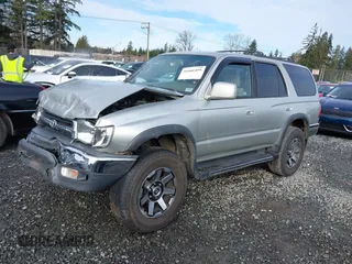 1999 Toyota 4Runner SR5 z VIN JT3HN86R0X0196528, wystawiony jako IAAI lot #41666499 z przebiegiem 294 216 mil mil oraz . Historia ofert i sprzedaży dostępna na DreamBid. Obrazek 14.