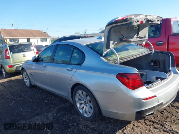2014 BMW 7 Series 740i with VIN WBAYA6C54ED144450, listed as a IAAI auction lot 41680060 with 999,999 mi miles. Bid and sale history available at carsss.com. Image 13.