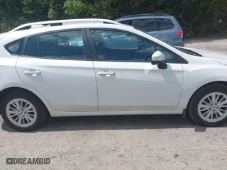 2017 Subaru Impreza Premium with VIN 4S3GTAD67H3748698, listed as a IAAI auction lot 39917558 with 56,945 mi miles. Bid and sale history available at carsss.com. Image 13.