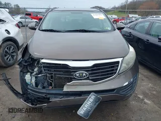 2011 Kia Sportage LX with VIN KNDPB3A20B7024111, listed as a IAAI auction lot 41945892 with 139,605 mi miles and . Bid and sale history available at carsss.com. Image 6.