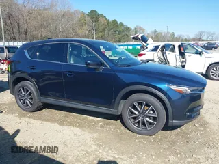 2018 Mazda CX-5 Grand Touring with VIN JM3KFADM1J0322049, listed as a IAAI auction lot 41891079 with 174,939 mi miles and . Bid and sale history available at DreamBid. Image 13.