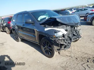 2018 Jeep Grand Cherokee Laredo E with VIN 1C4RJEAGXJC124726, listed as a IAAI auction lot 41990741 with 112,217 mi miles and . Bid and sale history available at DreamBid. Image 1.