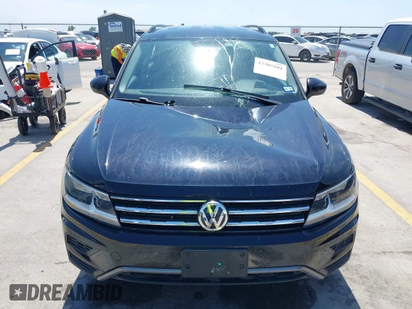 2021 Volkswagen Tiguan S with VIN 3VV1B7AX9MM067347, listed as a IAAI auction lot 42305101 with 77,042 mi miles and . Bid and sale history available at DreamBid. Image 17.