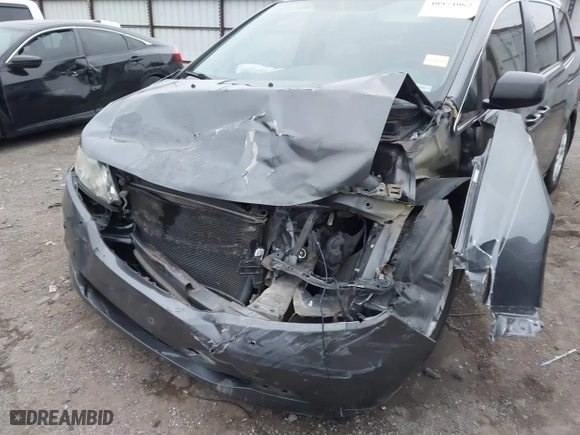 2013 Honda Odyssey LX with VIN 5FNRL5H24DB042230, listed as a IAAI auction lot 40954067 with 212,154 mi miles. Bid and sale history available at carsss.com. Image 6.