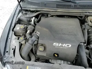 2018 Ford Taurus SHO с VIN 1FAHP2KT4JG127026, выставлен на аукционе Copart как лот 57410715 с пробегом 56 728 миль миль и Списание • Salvage title. История ставок и продаж доступна на DreamBid. Изображение 13.