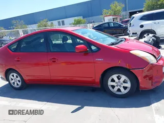 2007 Toyota Prius z VIN JTDKB20U373288946, wystawiony jako IAAI lot #42385536 z przebiegiem 133 336 mil mil oraz . Historia ofert i sprzedaży dostępna na DreamBid. Obrazek 13.