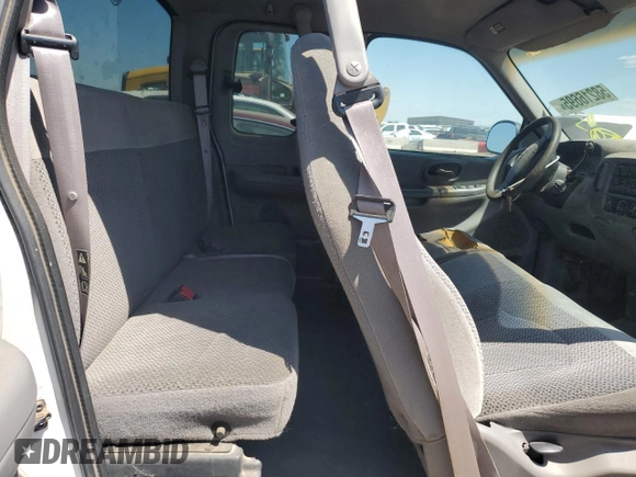 1999 Ford F-150 with VIN 2FTRX17L0XCA37979, listed as a Copart auction lot 58216695 with 256,055 mi miles and Clean title. Bid and sale history available at DreamBid. Image 10.