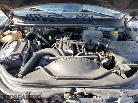 2004 Jeep Grand Cherokee Laredo z VIN 1J4GW48S84C200617, wystawiony jako Copart lot #51732045 z przebiegiem 171 452 mil mil oraz Nie do naprawy • Non repairable. Historia ofert i sprzedaży dostępna na DreamBid. Obrazek 12.
