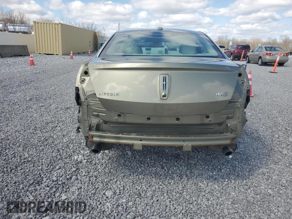 2013 Lincoln MKS with VIN 1LNHL9DKXDG617490, listed as a Copart auction lot 52282775 with 106,663 mi miles and Salvage Title. Bid and sale history available at carsss.com. Image 6.