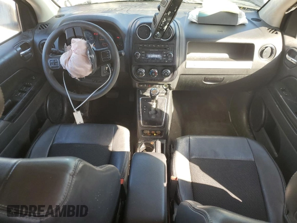 2014 Jeep Compass Altitude with VIN 1C4NJCBAXED819544, listed as a Copart auction lot 48363705 with 112,513 mi miles and Salvage Title. Bid and sale history available at DreamBid. Image 8.
