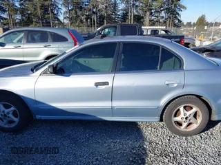 2003 Mitsubishi Galant ES with VIN 4A3AA46G93E213773, listed as a IAAI auction lot 41556766 with 182,969 mi miles. Bid and sale history available at carsss.com. Image 14.