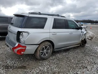 2018 Ford Expedition XLT with VIN 1FMJU1HT6JEA17396, listed as a Copart auction lot 86210324 with 70,990 mi miles and Salvage Title. Bid and sale history available at carsss.com. Image 3.
