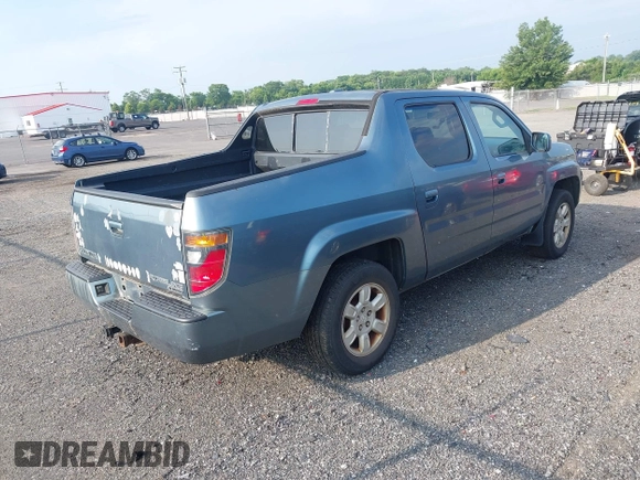 2006 Honda Ridgeline RTL with VIN 2HJYK16526H531884, listed as a IAAI auction lot 42796524 with 334,489 mi miles and . Bid and sale history available at DreamBid. Image 4.