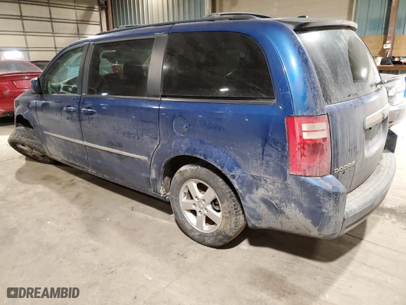 2010 Dodge Grand Caravan SXT with VIN 2D4RN5D14AR101531, listed as a Copart auction lot 42617595 with 238,350 mi miles and Salvage Title. Bid and sale history available at carsss.com. Image 2.