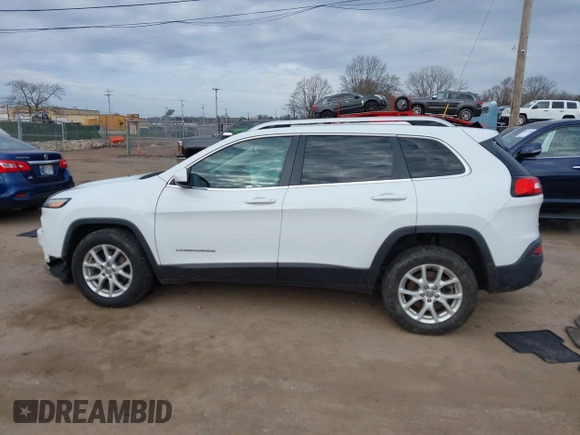 2015 Jeep Cherokee Latitude z VIN 1C4PJMCS9FW625521, wystawiony jako IAAI lot #41894602 z przebiegiem 112 865 mil mil oraz . Historia ofert i sprzedaży dostępna na DreamBid. Obrazek 14.