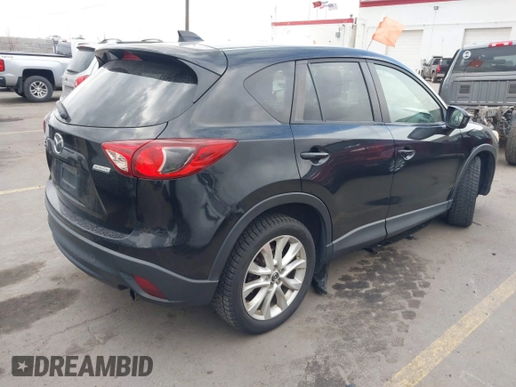 2013 Mazda CX-5 Grand Touring with VIN JM3KE4DEXD0154638, listed as a IAAI auction lot 41528944 with 195,159 mi miles. Bid and sale history available at carsss.com. Image 4.