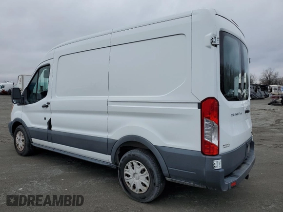 2015 Ford Transit Cargo with VIN 1FTYE1CM7FKA24477, listed as a Copart auction lot 86310214 with 54,098 mi miles and Salvage title. Bid and sale history available at DreamBid. Image 2.