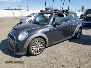 2013 MINI Hardtop John Cooper Works with VIN WMWSU9C59DT384919, listed as a Copart auction lot 77842874 with 109,186 mi miles and Salvage title. Bid and sale history available at DreamBid. Image 1.