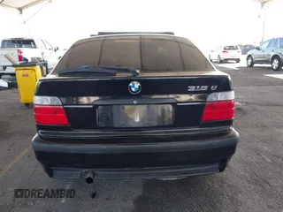 1996 BMW 3-Series 318TI with VIN WBACG8324TAU38424, listed as a IAAI auction lot 41529537 with 160,199 mi miles. Bid and sale history available at carsss.com. Image 16.