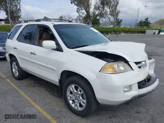 2004 Acura MDX Touring Pkg w/Navigation with VIN 2HNYD18834H520180, listed as a IAAI auction lot 41934124 with 201,817 mi miles. Bid and sale history available at carsss.com. Image 1.