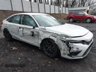2024 Honda Civic Sport z VIN 2HGFE2F5XRH557468, wystawiony jako IAAI lot #41940743 z przebiegiem 10 618 mil mil oraz . Historia ofert i sprzedaży dostępna na DreamBid. Obrazek 1.