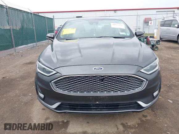 2019 Ford Fusion Titanium with VIN 3FA6P0K9XKR259556, listed as a IAAI auction lot 41823997 with 132,071 mi miles. Bid and sale history available at carsss.com. Image 12.